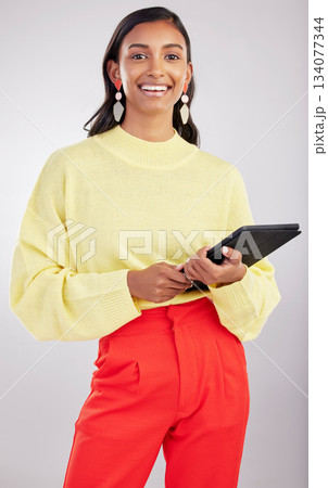 Happy, work and portrait of a woman with a tablet isolated on a white background in a studio. Smile, business and a young girl with technology for social media, email or internet access on a backdrop Happy, work and portrait of a woman with a tablet isolated on a white background in a studio. Smile, business and a young girl with technology for social media, email or internet access on a backdrop 134077344