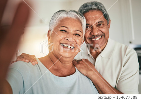 Happy, love and elderly couple smile for selfie, profile picture or photo in living room, cheerful and embrace. Portrait, retirement and excited old people hug enjoy retired lifestyle in their home Happy, love and elderly couple smile for selfie, profile picture or photo in living room, cheerful and embrace. Portrait, retirement and excited old people hug enjoy retired lifestyle in their home 134077389