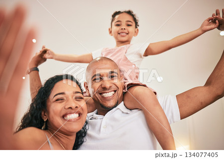 Selfie, portrait and happy family fun, playing and enjoy time together with home photo memory of weekend bonding. Happiness, love and child care from mother, father and parents with kids on shoulder 134077405
