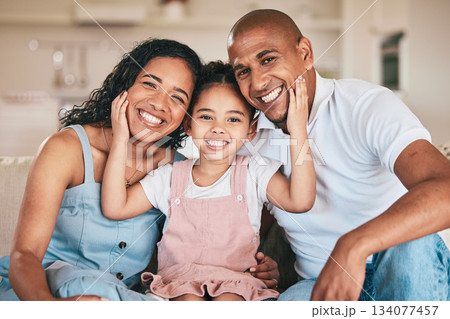 Family in portrait, parents and happy child relaxing at home in support, love or bonding together on sofa. Happiness, people or living room with relationship and spending quality time at the weekend 134077457