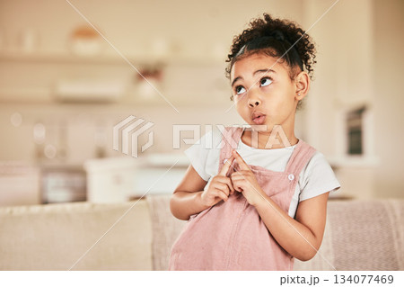 Thinking face, child and ideas in home on a living room couch and wondering with mockup. Young, lounge sofa and cute, curious girl in a relaxed house or indoor with youth idea and planning expression Thinking face, child and ideas in home on a living room couch and wondering with mockup. Young, lounge sofa and cute, curious girl in a relaxed house or indoor with youth idea and planning expression 134077469
