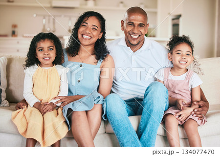 Family in portrait, parents and happy children relaxing at home in support, love or bonding together on sofa. Happiness, people or living room with relationship or spending quality time on a weekend Family in portrait, parents and happy children relaxing at home in support, love or bonding together on sofa. Happiness, people or living room with relationship or spending quality time on a weekend 134077470