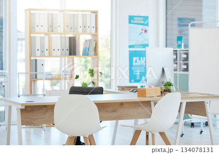 Medical, consulting and hospital with desk in empty room for healthcare, wellness or interior design. Medicine, space and insurance with nobody and furniture in clinic for diagnosis, surgery or virus 134078131