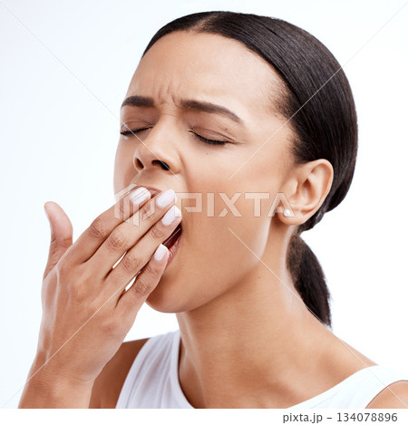 Hand, yawn and tired woman in studio with fatigue, exhaustion and burnout against white background. Yawning, sleepy and girl with insomnia problem, low energy and lazy, bored and emoji while isolated Hand, yawn and tired woman in studio with fatigue, exhaustion and burnout against white background. Yawning, sleepy and girl with insomnia problem, low energy and lazy, bored and emoji while isolated 134078896