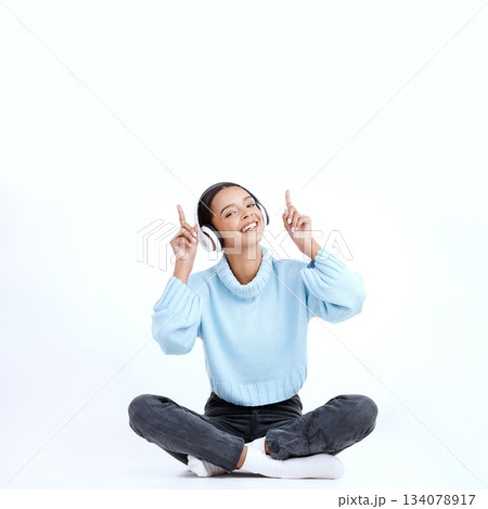 Relax music, portrait and happy woman point at radio sales promotion, advertising space or audio podcast mockup. Marketing commercial, studio and sound streaming female listening on white background Relax music, portrait and happy woman point at radio sales promotion, advertising space or audio podcast mockup. Marketing commercial, studio and sound streaming female listening on white background 134078917