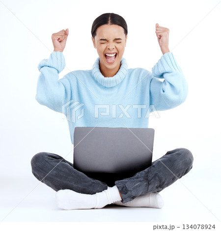 Fist pump celebration, laptop winner and happy woman celebrate victory news, winning achievement or profit success. Cheers, bonus salary announcement and excited studio person on white background 134078924