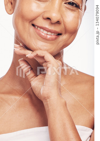 Portrait, cosmetics and woman with skincare, spa and luxury treatment against a studio background. Face, female and mature person with beauty, grooming and organic facial with self care and wellness 134079094