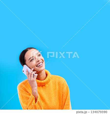 Laugh, mockup and woman on phone in studio with happiness and a smile from talk. Happy, isolated, and blue background and a young female and gen z model laughing on a mobile web conversation Laugh, mockup and woman on phone in studio with happiness and a smile from talk. Happy, isolated, and blue background and a young female and gen z model laughing on a mobile web conversation 134079390