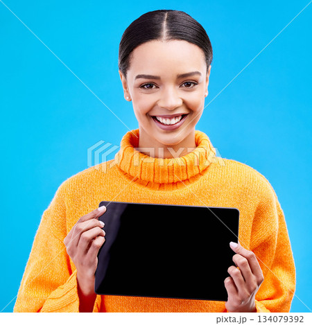 Tablet, mockup and smile with portrait of woman in studio for website, technology and social media. Networking, internet and connection with female on blue background for app, announcement and search Tablet, mockup and smile with portrait of woman in studio for website, technology and social media. Networking, internet and connection with female on blue background for app, announcement and search 134079392