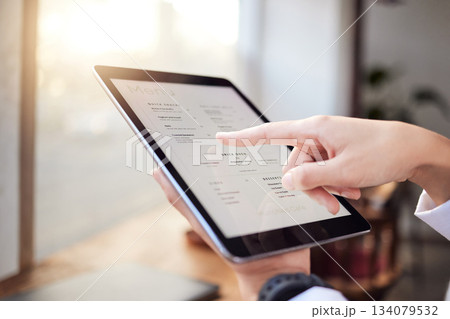 Closeup person, menu and tablet in cafe for ordering food, meal and lunch on technology. Restaurant customer, hands and screen of digital options, app choice and selection list online in coffee shop Closeup person, menu and tablet in cafe for ordering food, meal and lunch on technology. Restaurant customer, hands and screen of digital options, app choice and selection list online in coffee shop 134079532