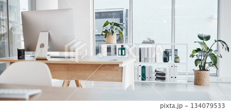 Empty office, interior and computer on desk in workplace, company or workspace. Room, desktop and table with corporate furniture, plants and window with modern design for business with nobody. Empty office, interior and computer on desk in workplace, company or workspace. Room, desktop and table with corporate furniture, plants and window with modern design for business with nobody. 134079533