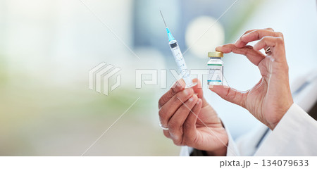 Vaccine bottle, needle and hands of doctor in a medicare hospital getting ready for a monkeypox treatment. Healthcare, injection and closeup of a medical worker with a virus vaccination in a clinic. Vaccine bottle, needle and hands of doctor in a medicare hospital getting ready for a monkeypox treatment. Healthcare, injection and closeup of a medical worker with a virus vaccination in a clinic. 134079633