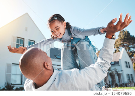 Family, happy or father lift girl in home garden for bonding, quality time or playing outdoors. Love, new house and dad with child flying in air and smile on summer vacation, weekend and holiday game 134079680