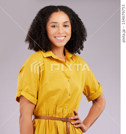 Happy black woman, confident and portrait smile standing with hands on waist against a gray studio background. Isolated and stylish African American female model with afro smiling in confidence Happy black woman, confident and portrait smile standing with hands on waist against a gray studio background. Isolated and stylish African American female model with afro smiling in confidence 134079753