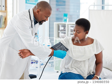 Helping, healthcare and a doctor with a black woman for hypertension, health check and service. Help, medical and a gp consulting with a patient for blood pressure exam, cardiology or monitor Helping, healthcare and a doctor with a black woman for hypertension, health check and service. Help, medical and a gp consulting with a patient for blood pressure exam, cardiology or monitor 134080350