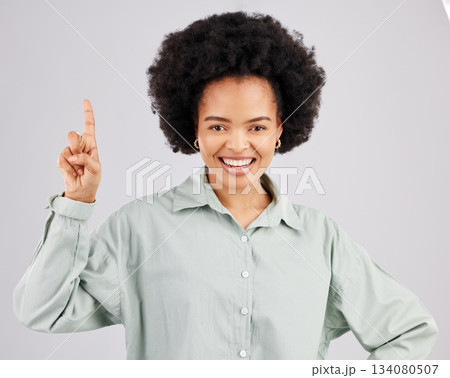 Woman portrait, up direction and idea hand sign with a smile in a studio with a solution to a question. Isolated, white background and female feeling happy and confident from inspiration and ideas 134080507