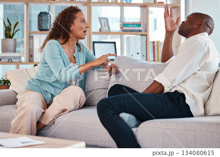 Couple, fight and argue on sofa for marriage problems, breakup or bad communication in lounge. Divorce, crisis and frustrated people in conflict, angry partner and betrayal of cheating, drama or hate Couple, fight and argue on sofa for marriage problems, breakup or bad communication in lounge. Divorce, crisis and frustrated people in conflict, angry partner and betrayal of cheating, drama or hate 134080615