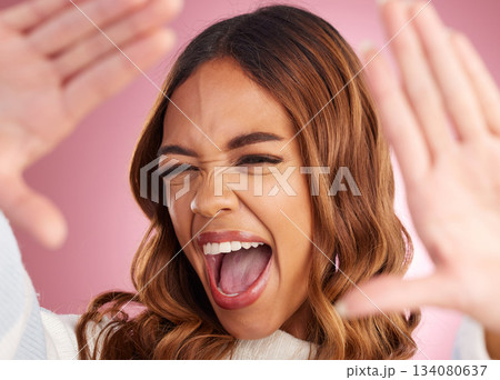 Wow, hands and selfie of woman excited in studio, announcement or good news of sale on pink background. Face, frame and girl cheerful, shocked and surprised by discount, promotion or photo Wow, hands and selfie of woman excited in studio, announcement or good news of sale on pink background. Face, frame and girl cheerful, shocked and surprised by discount, promotion or photo 134080637
