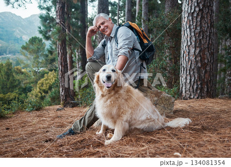 Man, hiking and happy dog outdoor in nature for exercise, fitness and trekking for health and wellness. Senior male and pet animal portrait on hike in forest for workout and cardio with backpack Man, hiking and happy dog outdoor in nature for exercise, fitness and trekking for health and wellness. Senior male and pet animal portrait on hike in forest for workout and cardio with backpack 134081354