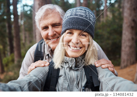 Senior couple, selfie and portrait, hiking in forest and happy people in nature and memory for social media post. Smile in picture, adventure and fitness outdoor, man and woman with active lifestyle Senior couple, selfie and portrait, hiking in forest and happy people in nature and memory for social media post. Smile in picture, adventure and fitness outdoor, man and woman with active lifestyle 134081432