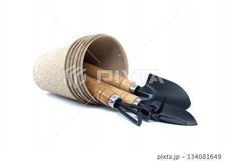 Gardening tools and pots arranged on a white background for planting 134081649