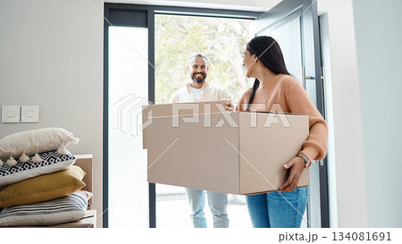 Happy people moving, new house and carrying box, man and woman, real estate property and home owner. Mortgage, couple walking in front door and partnership with smile, relationship and relocation Happy people moving, new house and carrying box, man and woman, real estate property and home owner. Mortgage, couple walking in front door and partnership with smile, relationship and relocation 134081691