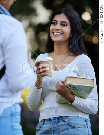 Smile, break or students talking at park on university campus for learning, education or books together. Girls talking, happy or students relax with coffee meeting for research or college knowledge Smile, break or students talking at park on university campus for learning, education or books together. Girls talking, happy or students relax with coffee meeting for research or college knowledge 134081725