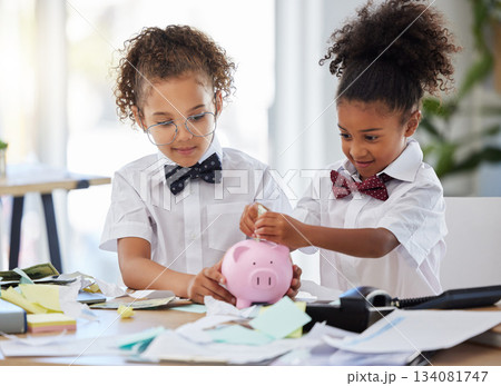 Saving, investment and girls pretending to be business people and learning about finance with a piggybank. Happy, banking and young children playing pretend as bankers with security of cash together 134081747