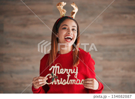 Christmas, decoration and portrait of woman with motivation holding xmas sign. Wow, excited and isolated happy female with celebration and a smile from winter festive, celebrating and youth happiness Christmas, decoration and portrait of woman with motivation holding xmas sign. Wow, excited and isolated happy female with celebration and a smile from winter festive, celebrating and youth happiness 134082087