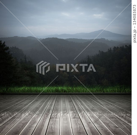 Wooden planks against mountains 134083873