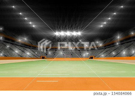 Displaying empty stadium with green field, orange border, floodlights, goalpost, tiered seating Displaying empty stadium with green field, orange border, floodlights, goalpost, tiered seating 134084066