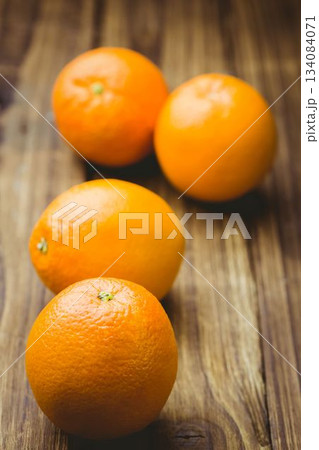 Close-up of oranges on wooden table 134084071
