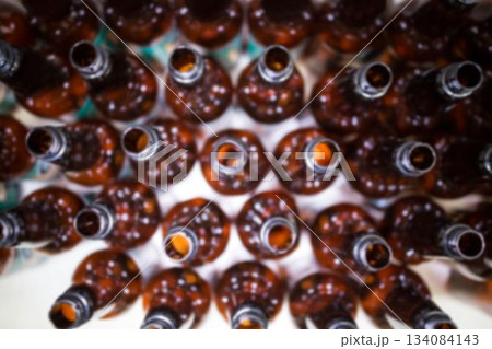 Overhead view of beer bottles in factory 134084143