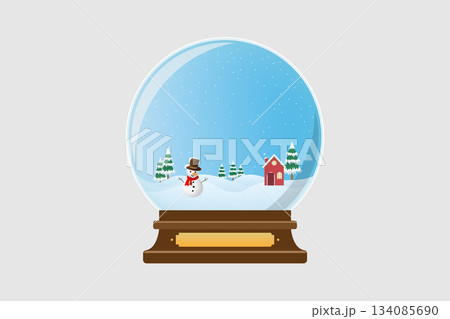 A winter scene inside a snow globe with a smiling snowman stands on snowy hills and a small red house with a chimney adds warmth to the wintry landscape surrounded by evergreen trees. 134085690