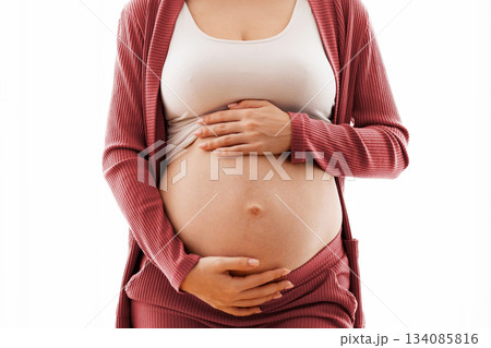 Cute Young Expectant Woman Touching Her Naked Belly While Posing Against Window At Home, Beautiful Millennial Future Mother Embracing Tummy And Smiling At Camera, Enjoying Prenatal Time, Copy Space 134085816