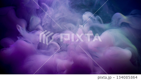 Glitter paint smoke. Shiny wave texture. Defocused purple blue color swirling cloud acrylic water spreading on abstract background. Glitter paint smoke. Shiny wave texture. Defocused purple blue color swirling cloud acrylic water spreading on abstract background. 134085864