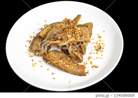 Deep fried fish with garlic 134086089
