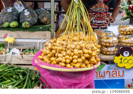 Fresh yellow dates in basket Fresh yellow dates in basket 134086098