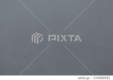 Flat design showing subtle speckled grey wall featuring gentle tonal variations, copy space 134089892