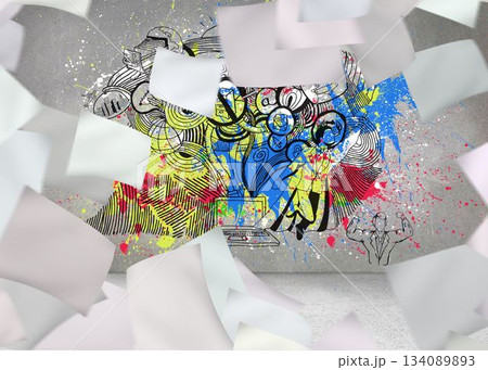 Papers over grey wall with illustrations and splashes 134089893