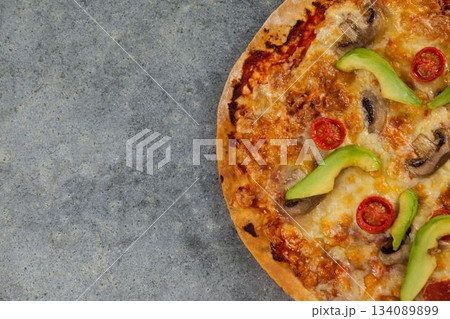 Fresh pizza on gray table Fresh pizza on gray table 134089899