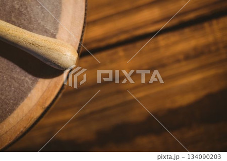 Cropped wooden stick and bodhran Cropped wooden stick and bodhran 134090203