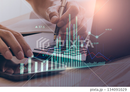 Stock market or forex trading graph and candlestick chart suitable for financial investment concept. Economy trends background for business idea and all art work design. Abstract finance background. Stock market or forex trading graph and candlestick chart suitable for financial investment concept. Economy trends background for business idea and all art work design. Abstract finance background. 134091029