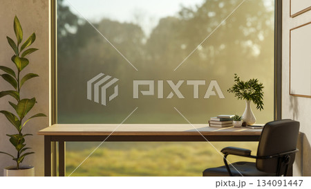 Books and decors on wooden table with armchair in front of a doorway with green nature outside. Books and decors on wooden table with armchair in front of a doorway with green nature outside. 134091447