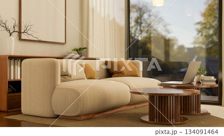 Laptop on wooden round table near a white sofa with cushion on brown carpet in lounge or living room Laptop on wooden round table near a white sofa with cushion on brown carpet in lounge or living room 134091464