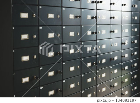 Flat design grid of safety deposit boxes is filling frame with label holders and inserted keys 134092197