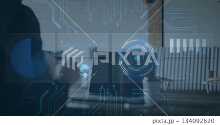 Presenting professional wearing shirt pointing at digital charts over laptop in office, copy space 134092620