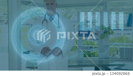 In modern office, doctor in white coat using digital medical image interface In modern office, doctor in white coat using digital medical image interface 134092668
