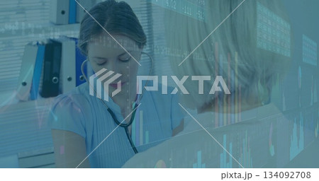 Healthcare professional using stethoscope over financial data and graphs image Healthcare professional using stethoscope over financial data and graphs image 134092708