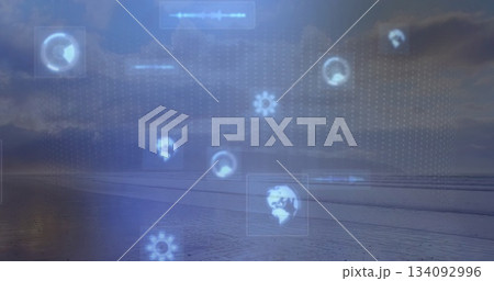 Floating digital interface elements over shoreline, showing rotating globe, gear and waveform icons Floating digital interface elements over shoreline, showing rotating globe, gear and waveform icons 134092996